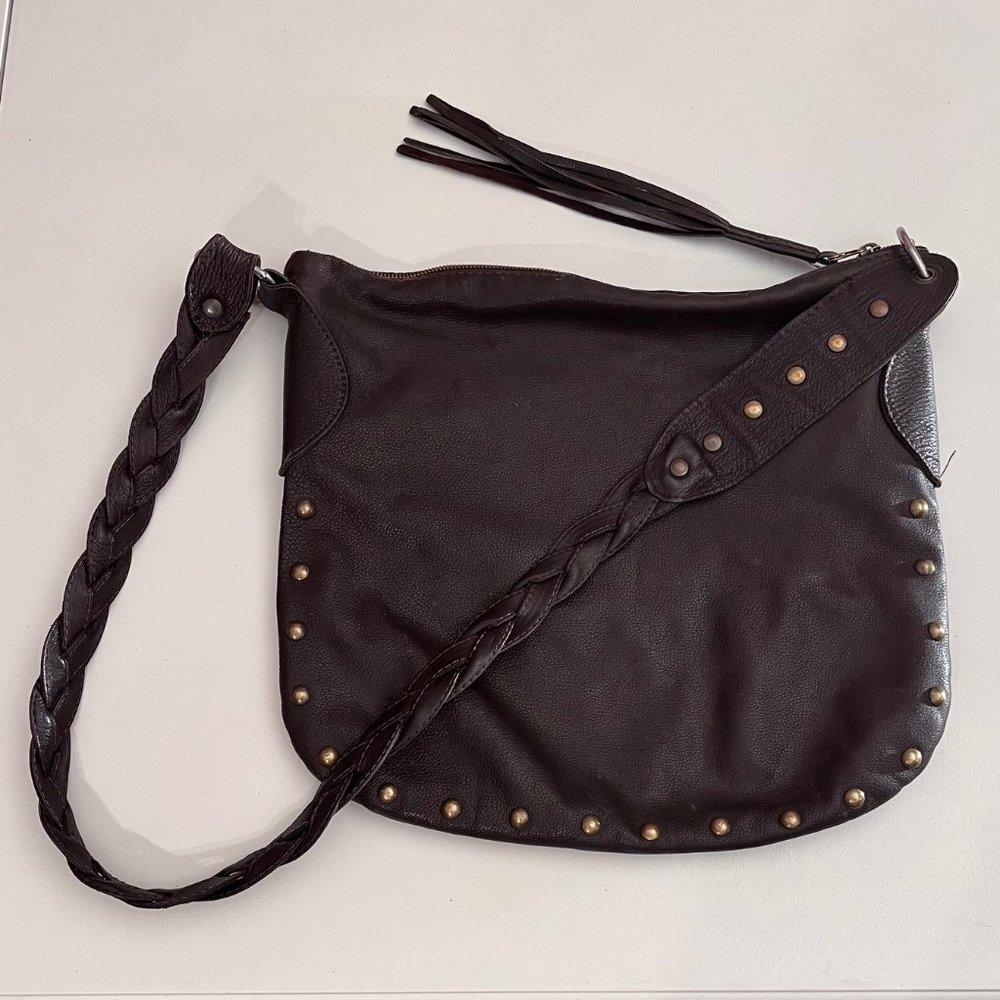 Brown Leather bag with braided strap and fringe zipper pull